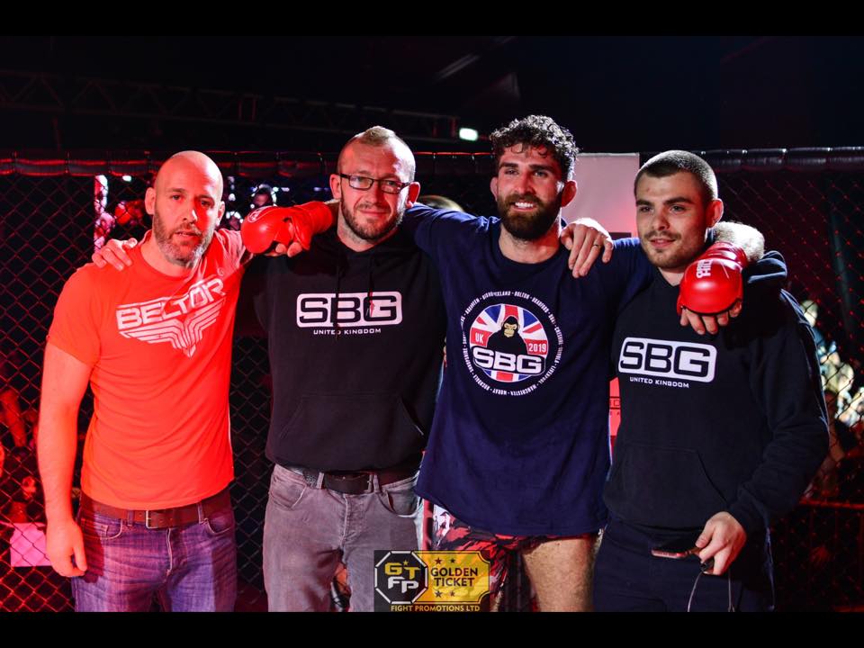 SBG Crewe fighters and coaches inside the cage